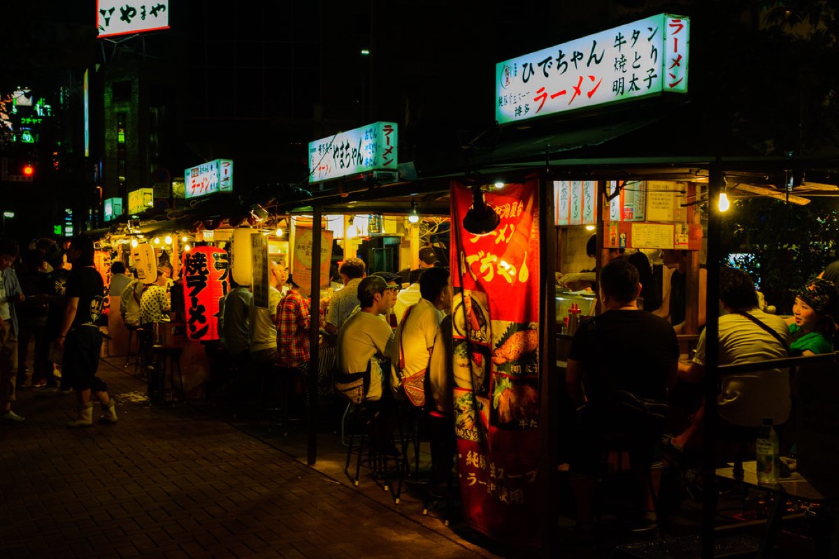 Yatai food stalls lit up at night in Nakasu, Fukuoka