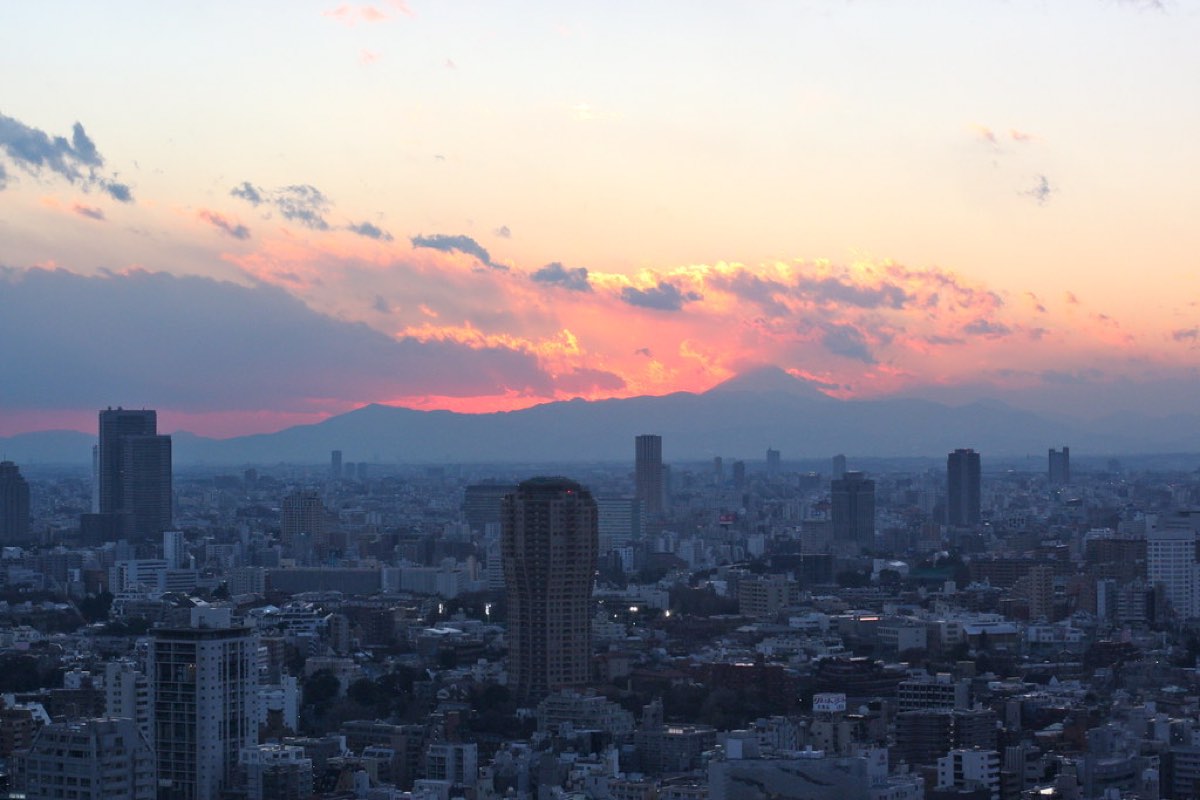Mount Fuji at sunset behind the Tokyo skyline