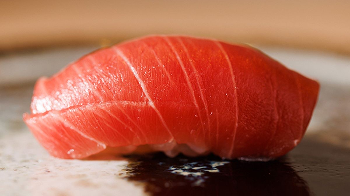 A piece of tuna nigiri at Sushi Umiji